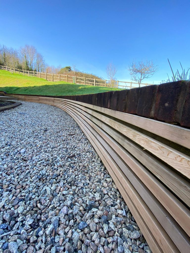 Edward Grimes Garden Designer - Garden in Silverton, Exeter in Devon - Bank and fencing